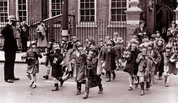 British Civilians Trained to Use Gas Masks <br />(The Literary Digest, 1936)