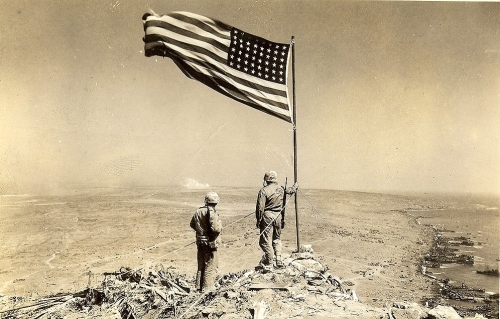 The Battle of Iwo Jima and the First Flag Raising on Mount Suribachi <br />(Yank Magazine, 1945)